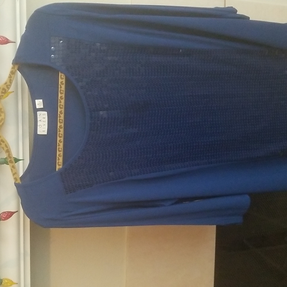 This fun blouse is from the beloved Joan River Ltd
